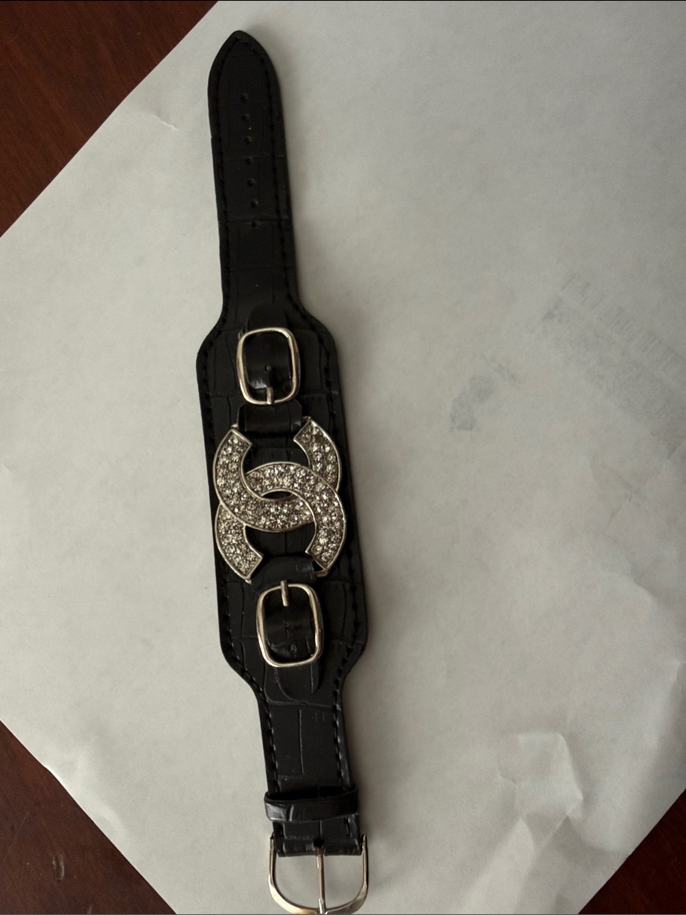 Black womens Leather Cuff Bracelet with Silver Crystal Emblem